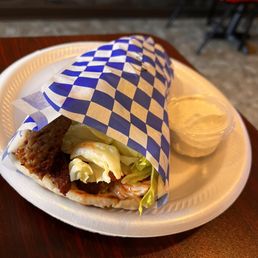 Savoring the flavors: The famous Mo's Gyro Wrap.